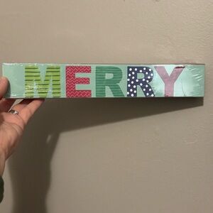 Colorful 'MERRY' Holiday Sign